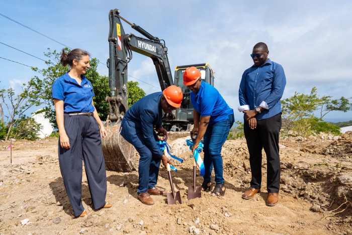 Minister of Health Hon. Phillip Telesford & NAWASA’s GM Ms. Dennies Burris turn sod