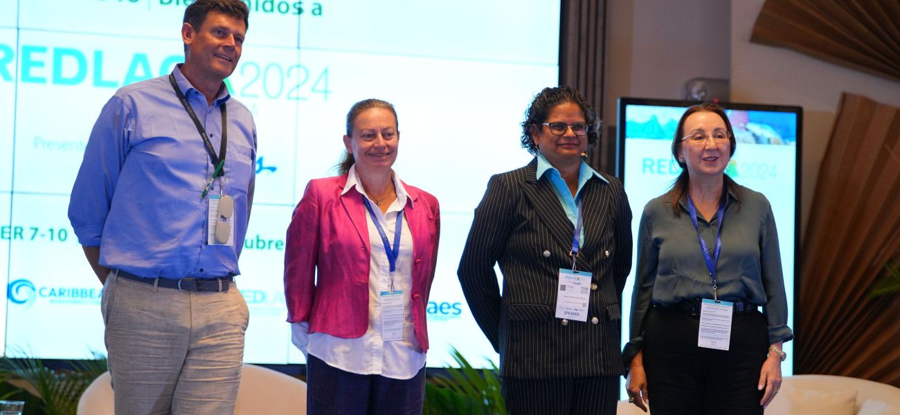Representatives from the German Development Bank and the Caribbean Biodiversity Fund pause for a photo at the launch of the Ecosystem-based Adaptation Facility’s fifth call for proposals on 8 October 2024 at the 26th RedLAC Congress in Saint Lucia.