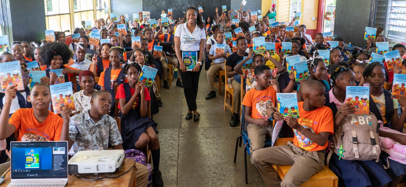 NCCA Officer Dr. Roxanne Graham-Victor engaging students of primary school about the NAP