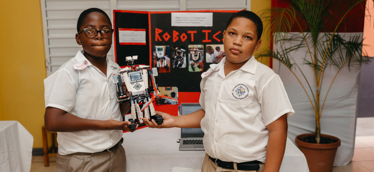 Students from Holy Innocents Anglican Primary school with their Robotics project